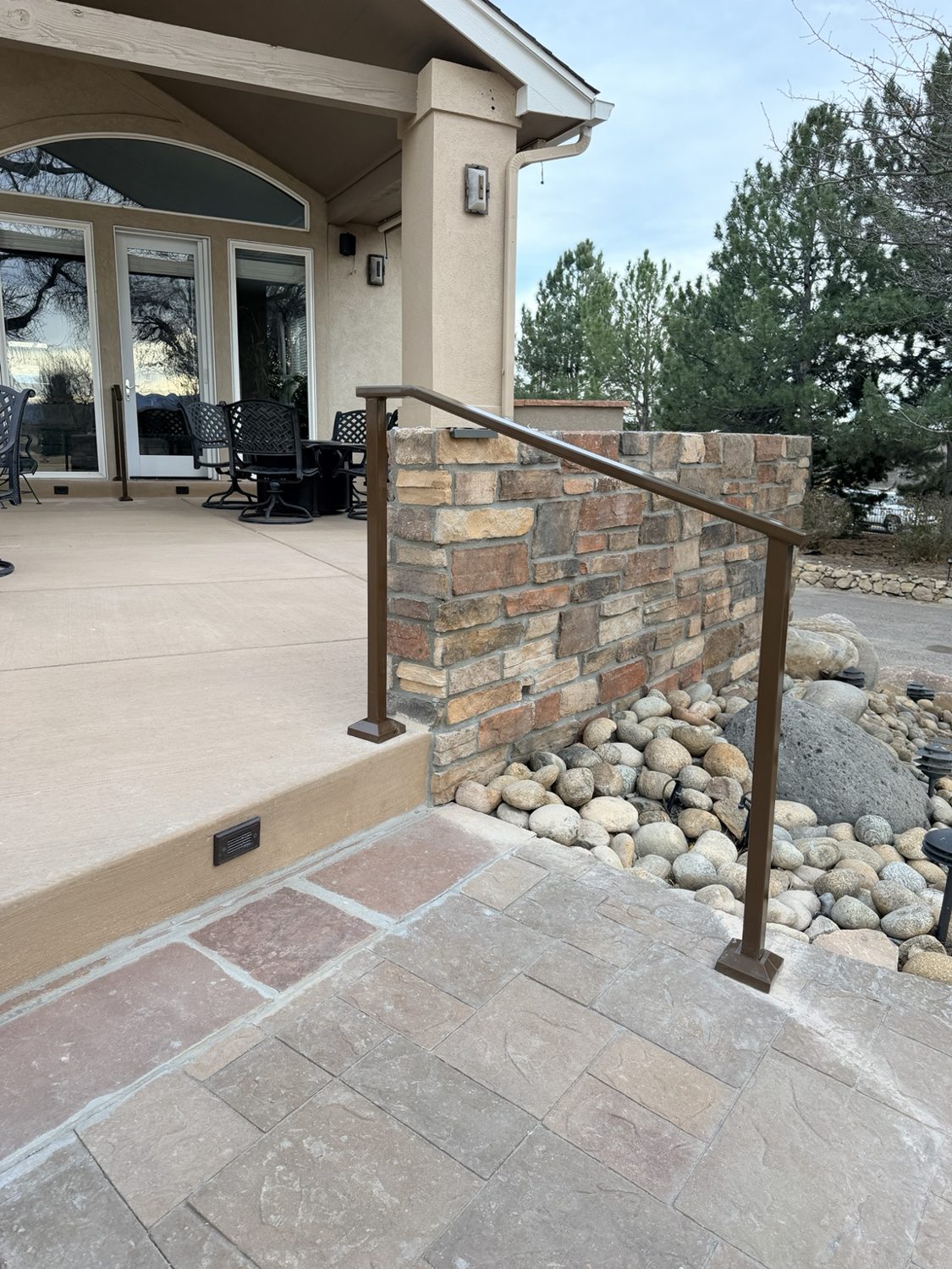 Exterior handrail with bronze finish by AR Custom Metal Works