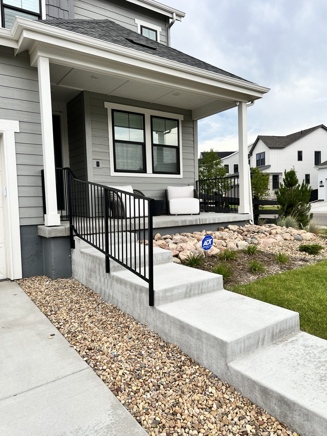 Front porch vertical picket railing by AR Custom Metal Works