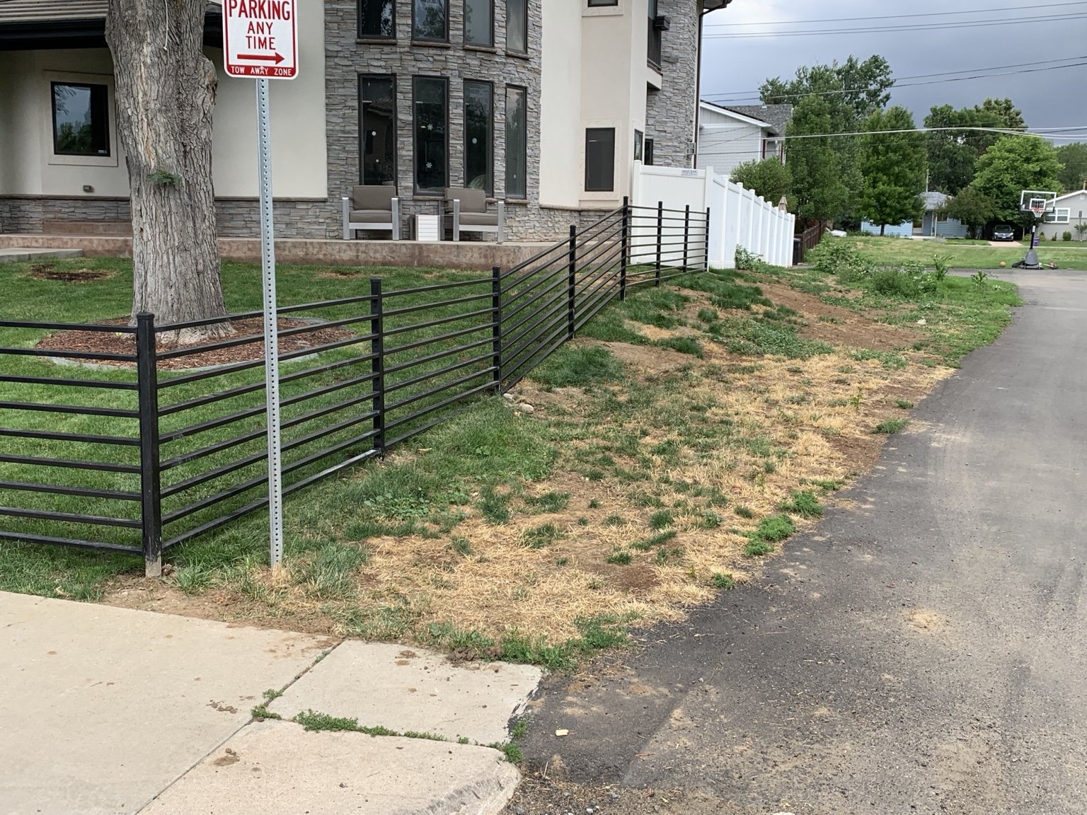 Custom horizontal steel perimeter fencing by AR Custom Metal Works
