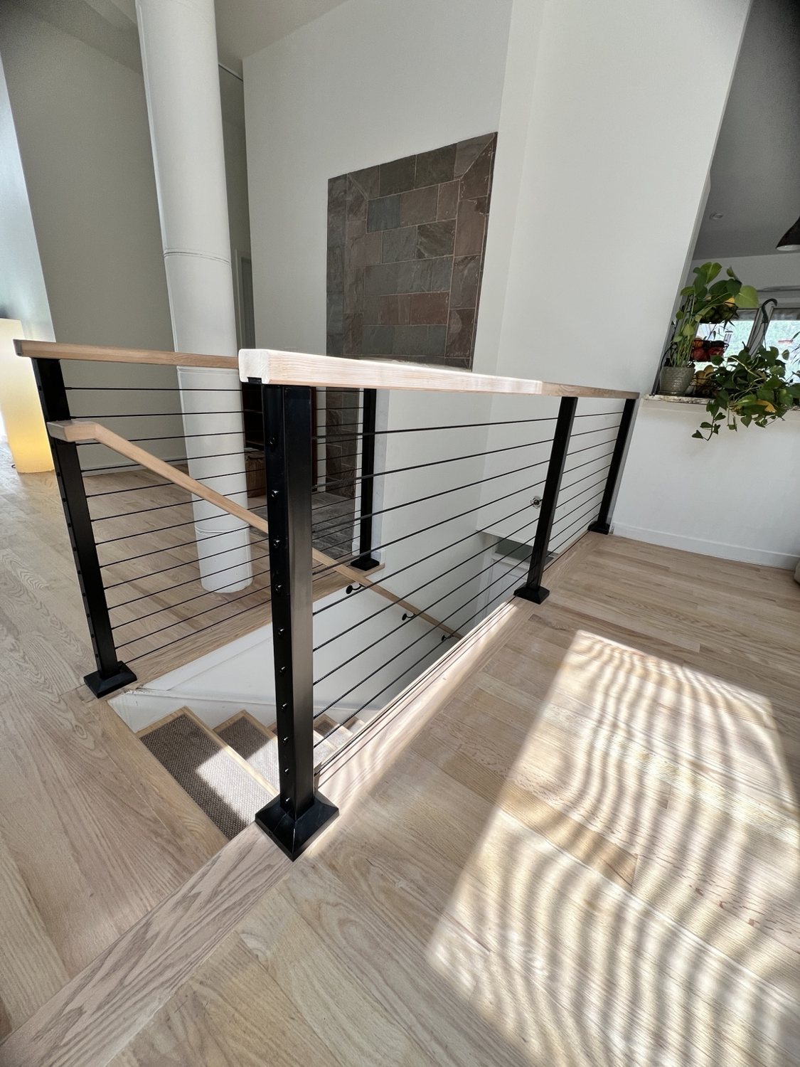 Cable railing and stairway detail by AR Custom Metal Works