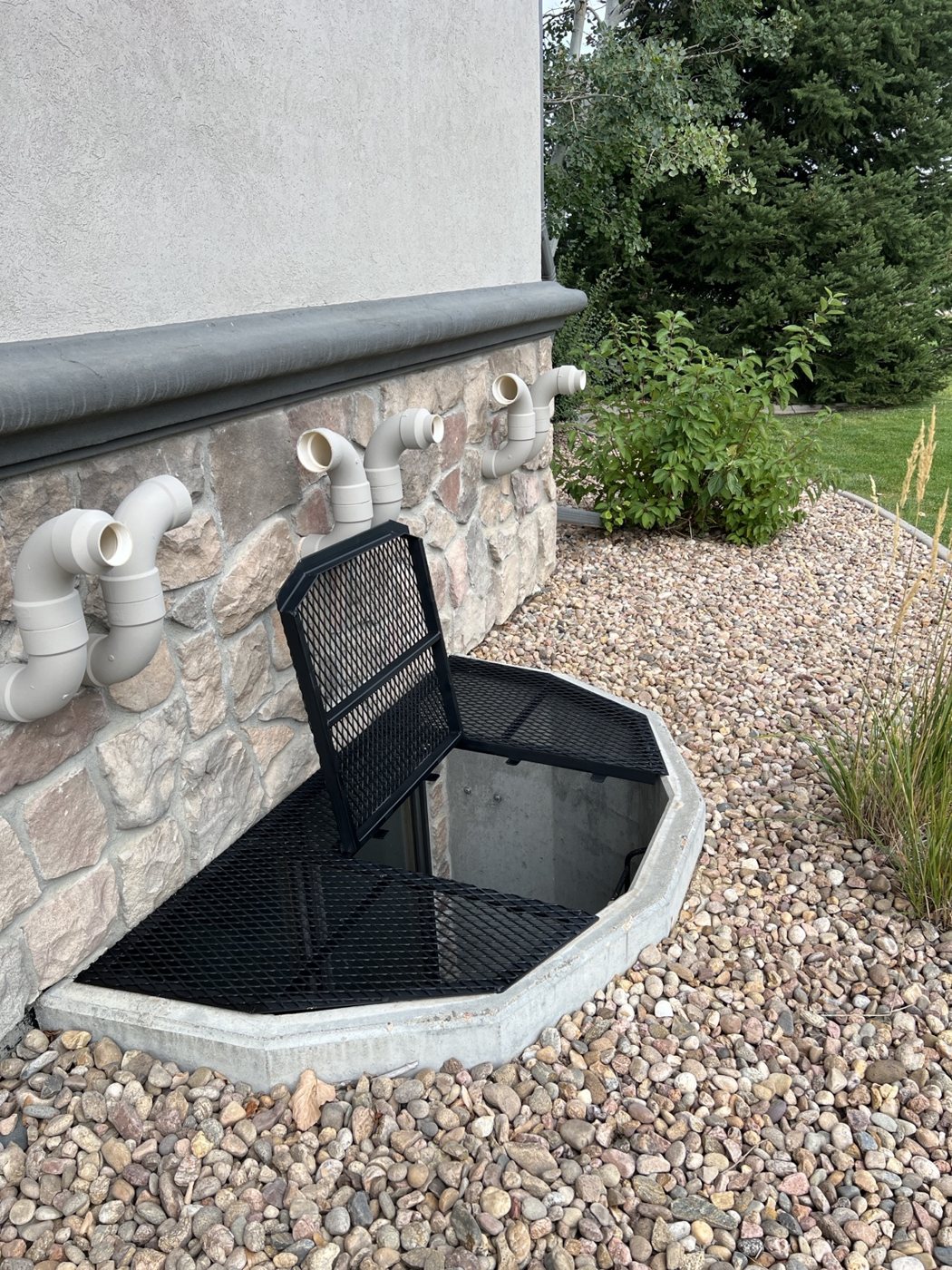 Custom access-door window well cover by AR Custom Metal Works