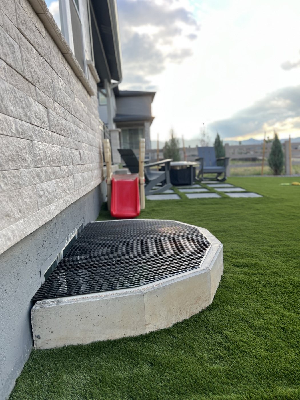 Low-profile window well cover by AR Custom Metal Works