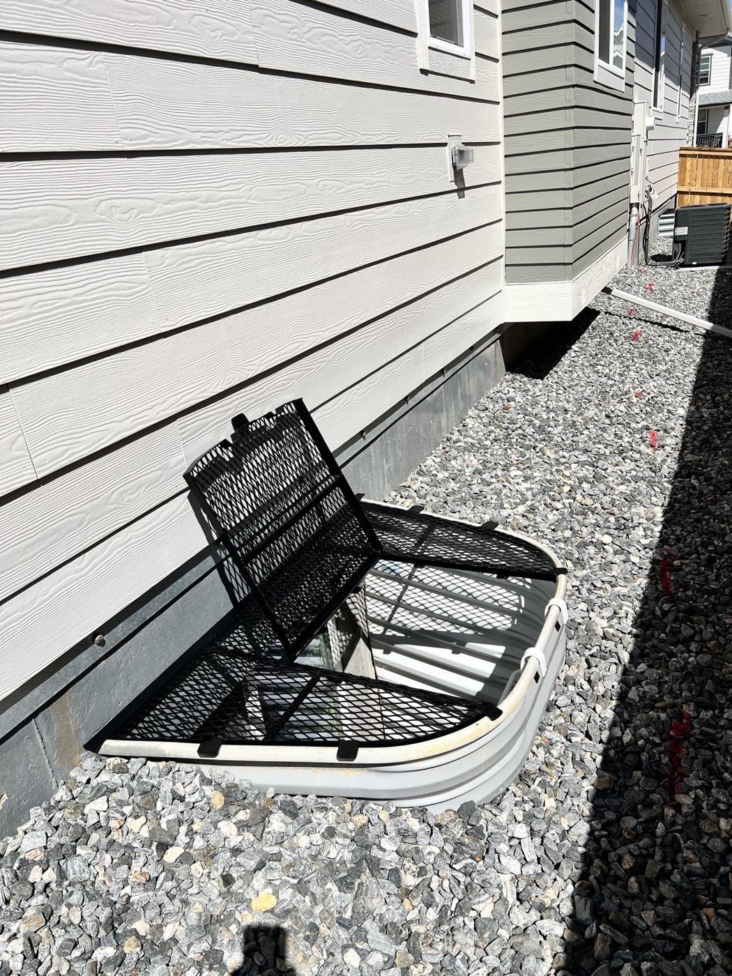 Hinged steel window well cover by AR Custom Metal Works
